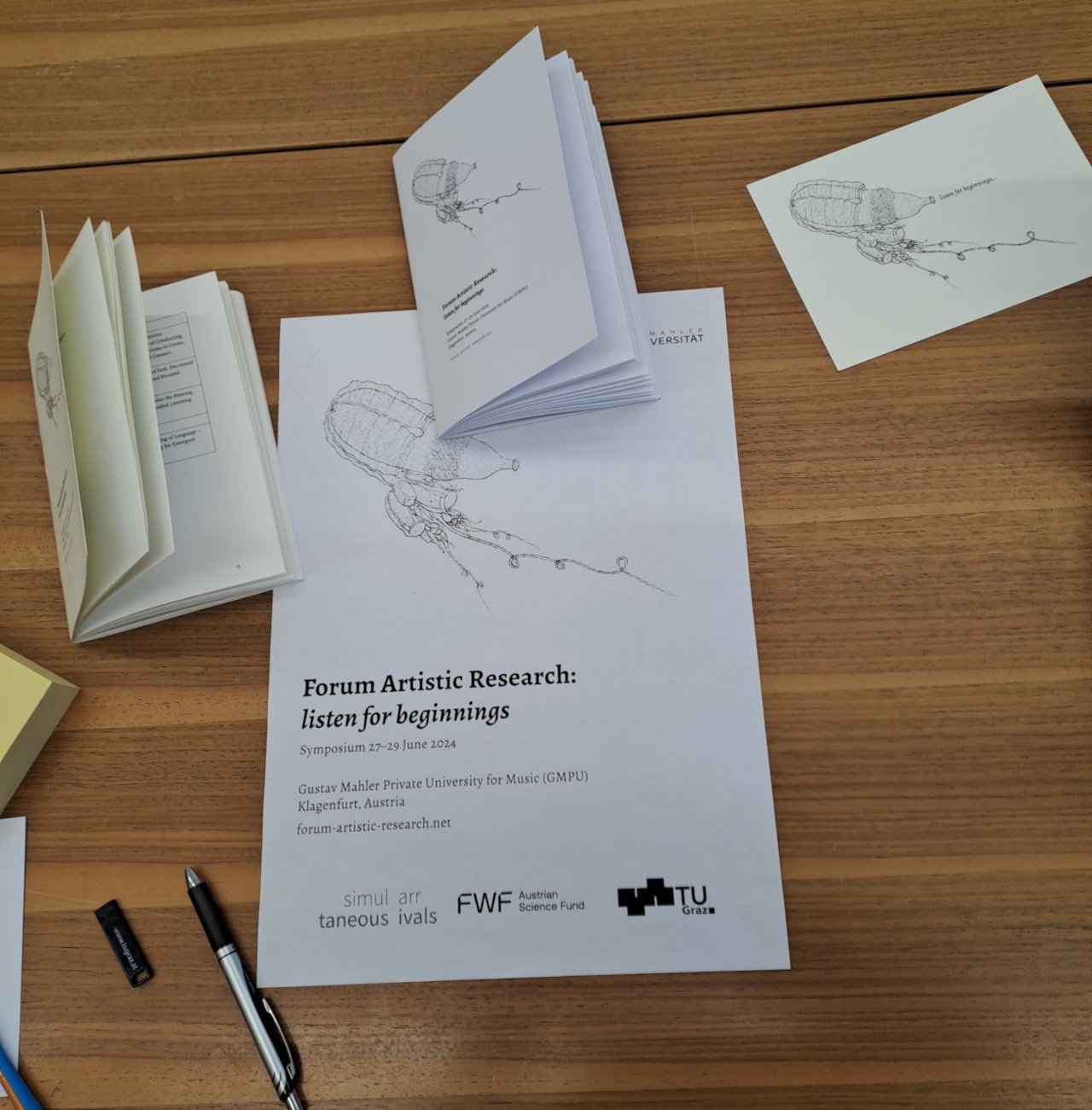 booklet and postcards of the symposium
