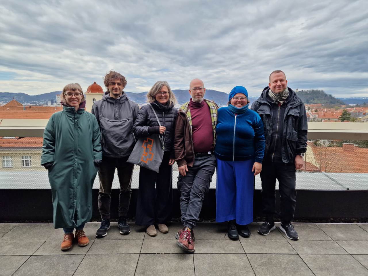 interval 1 team on a balcony