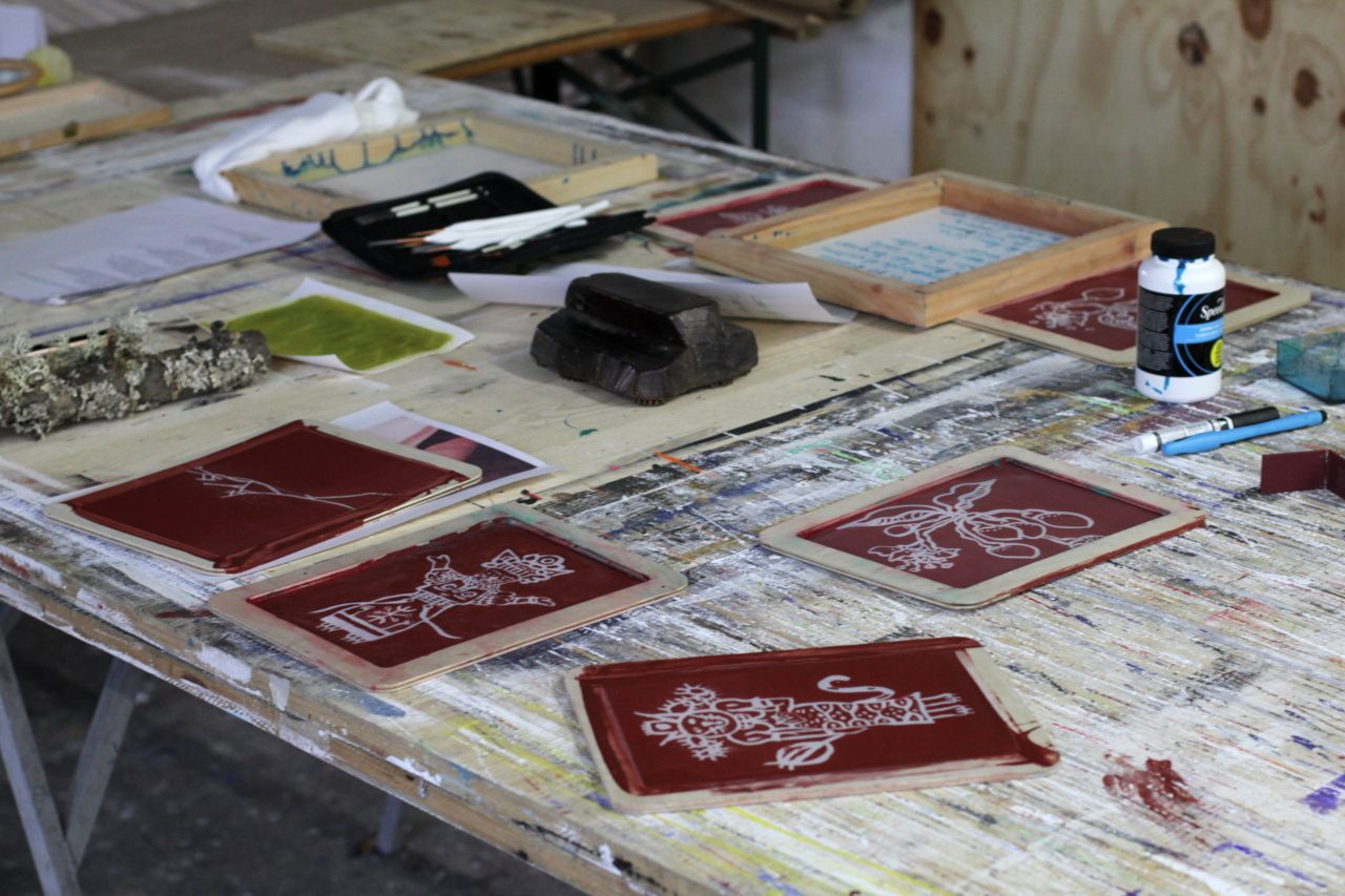 a table with silkscreen frames